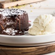 chocolate lava cake on a plate with vanilla ice cream